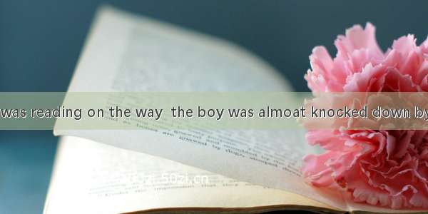 in the book he was reading on the way  the boy was almoat knocked down by a car.A Having